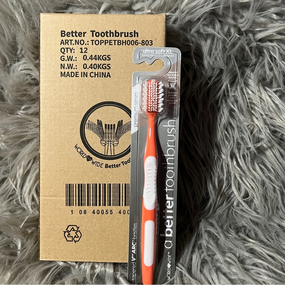 12 Orange and White Toothbrush
